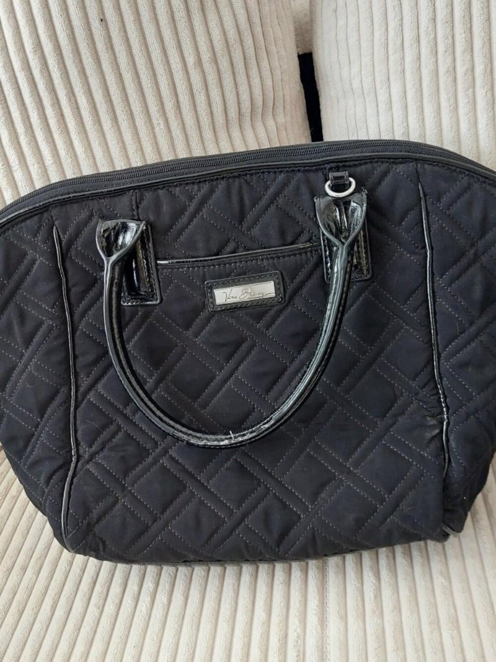 Black quilted vera bradley tote bag with silver hardware #loungewear #minimalist